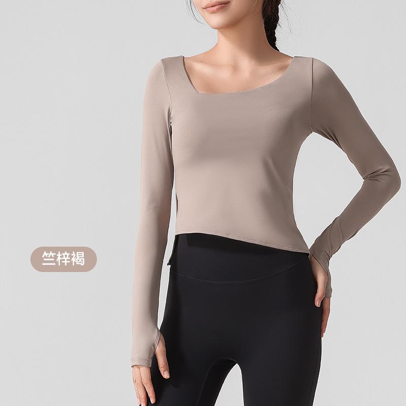 Yoga clothes new long-sleeved nude high elastic sports t-shirt women's one-piece fixed cup high-end fitness clothes spring and summer