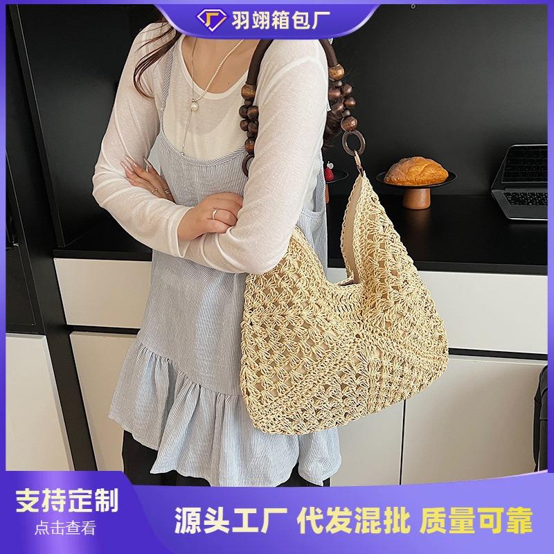 Large capacity hollow bag women's summer new versatile shoulder messenger bag woven seaside beach bag