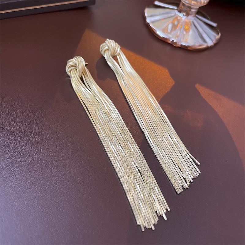 Elegant knotted metallic brushed long fringed silver needle earrings European and American personalized high-end earrings for