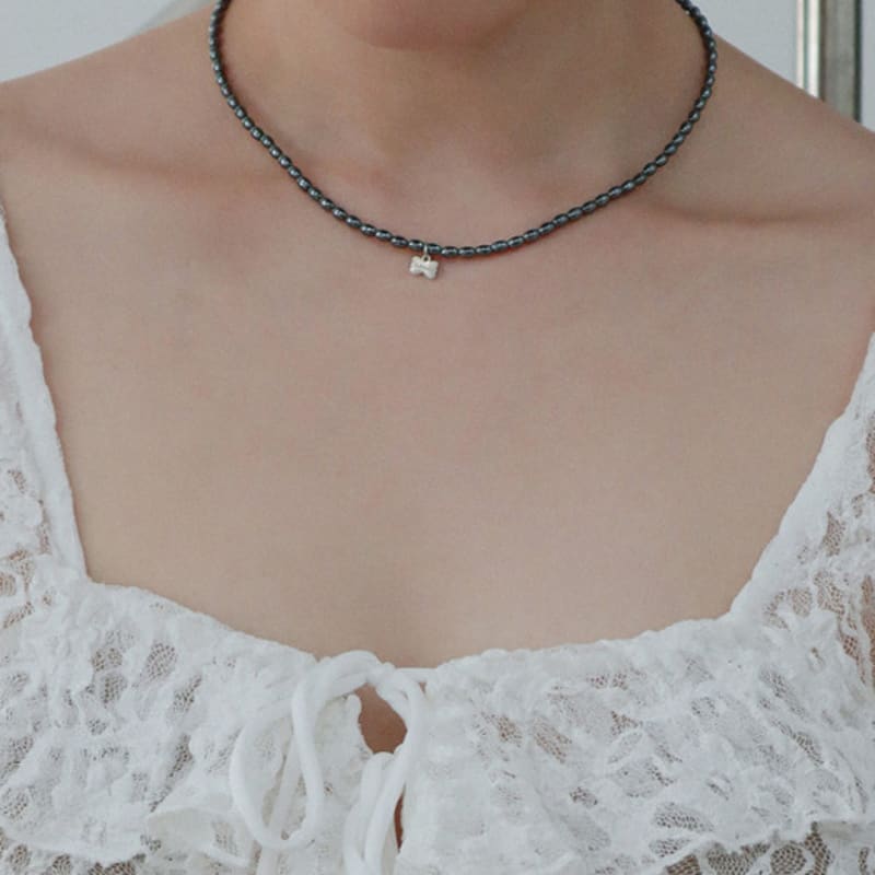 OudStudio Hematite Bow Charm Necklace