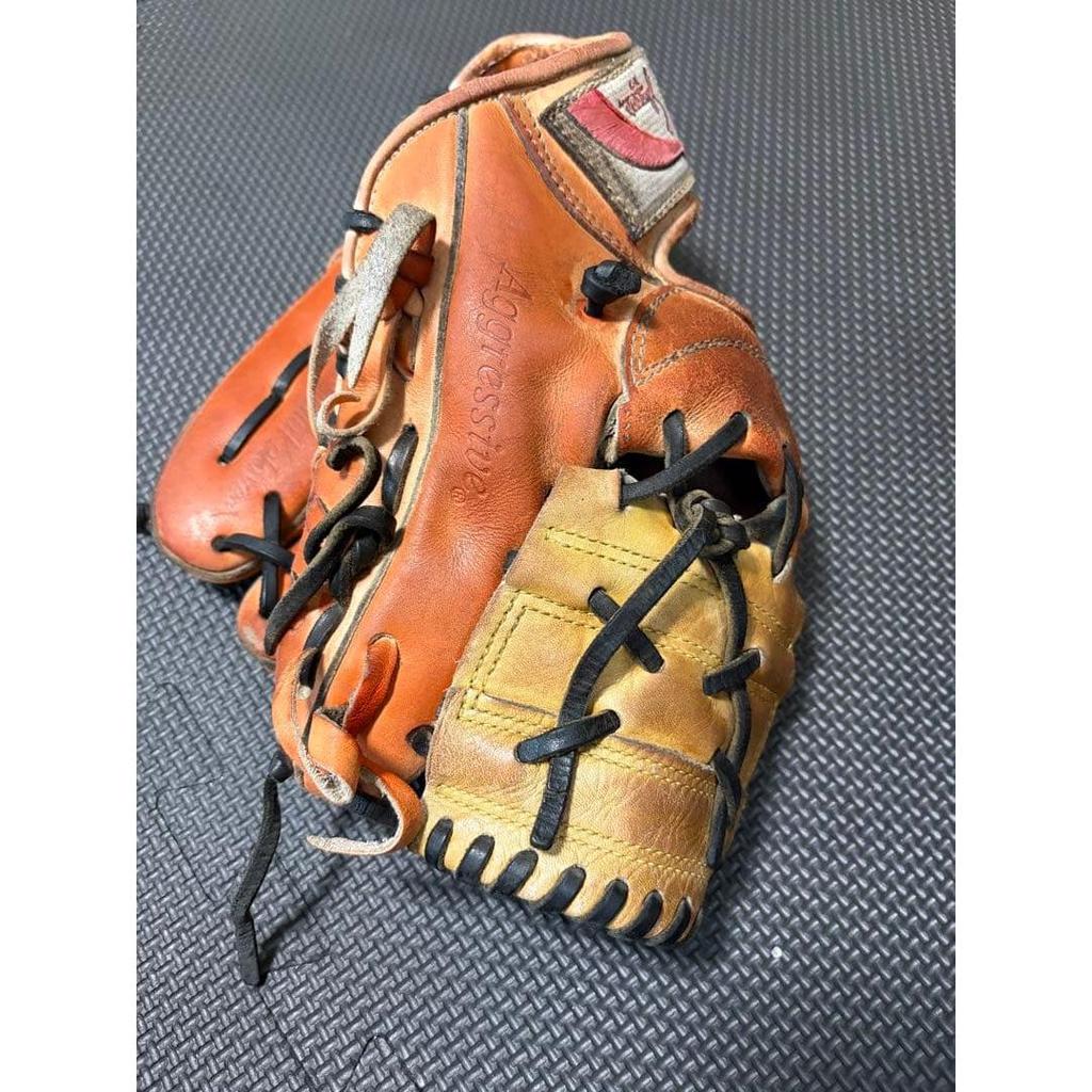 Used Kubota Slugger Hard Glove