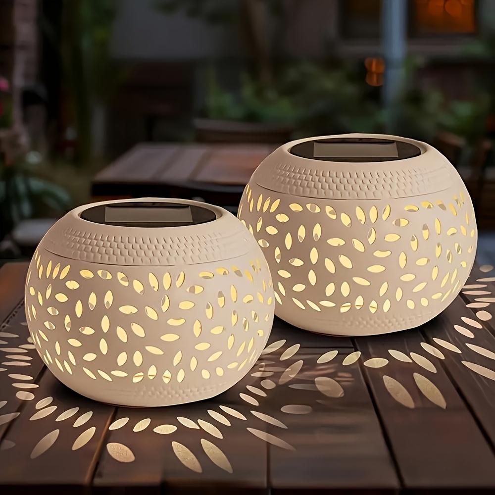 White outdoor solar lamp, openwork design, stylish and simple, high-quality LED, tabletop decorative lamp