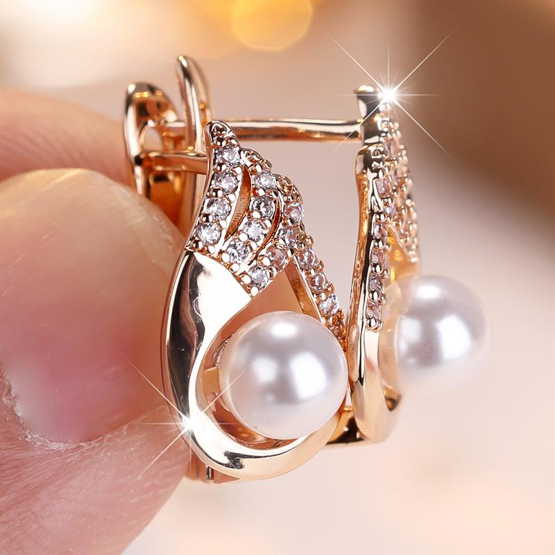 Elegant Feather and Faux Pearl Drop Earrings for Women, Luxurious Angel Wing Earrings… More