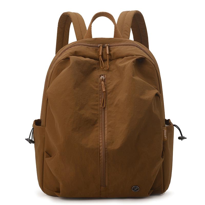 Schoolbag casual backpack female simple high school college student schoolbag Korean large capacity high sense travel backpack tide