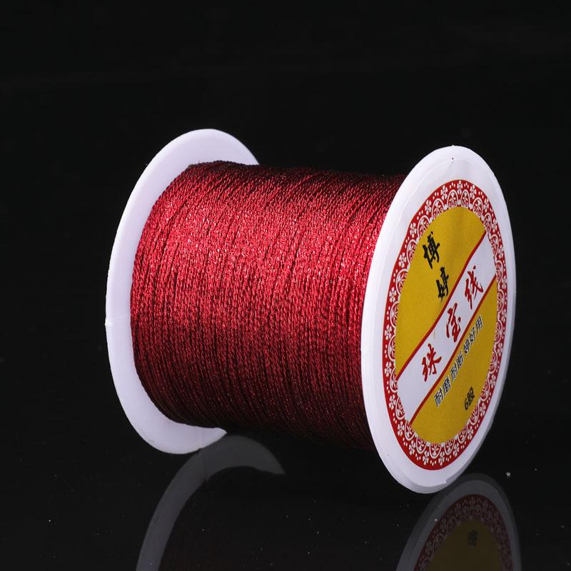 

Плетеный браслет из шелковых нитей золота и серебра с рисунком лотоса 3 strands