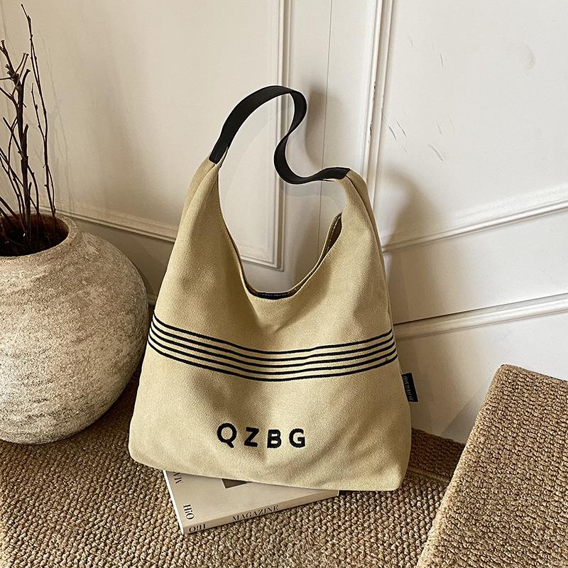

Ретро повседневная сумка для мамы и ребенка осень-зима простая холщовая сумка 2025 большая вместимость ленивый ветер простая сумка под мышкой на плечо хаки