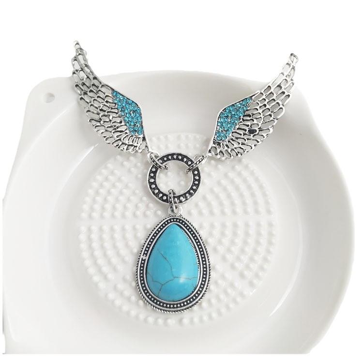 Schickes europäisch-amerikanisches Türkis-Flügel- & Wassertropfen-Halsketten-Ohrring-Set