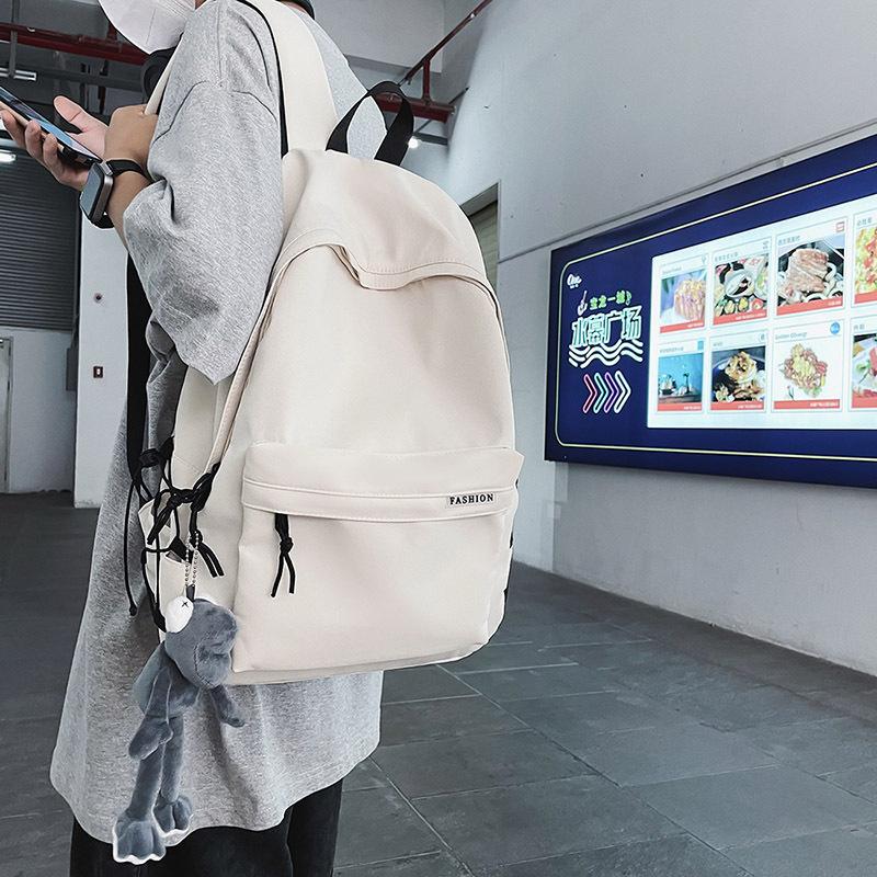 New Casual Backpack Simple College Style Backpack Large Capacity Student Bag Men and Women Couple Bag Travel Bag