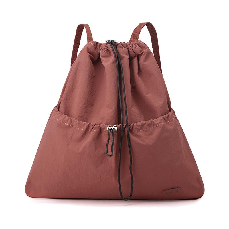 Niche daily leisure lightweight sports drawstring backpack commuter student schoolbag