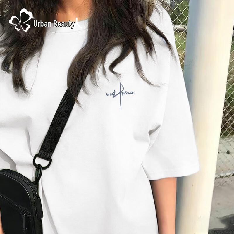 Tricou de damă din bumbac pur, cu croială largă, mânecă scurtă și grafică cu vârf de pix