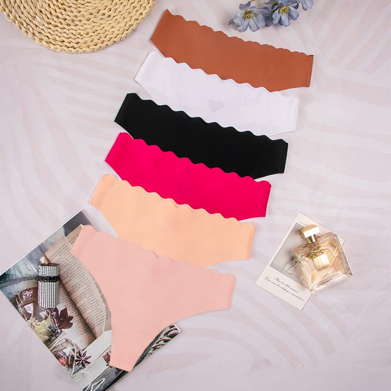 Women's Summer One Piece of Glue Solid Color Hollow Wave Waist Head No Trace Ice Silk Low Waist Underwear