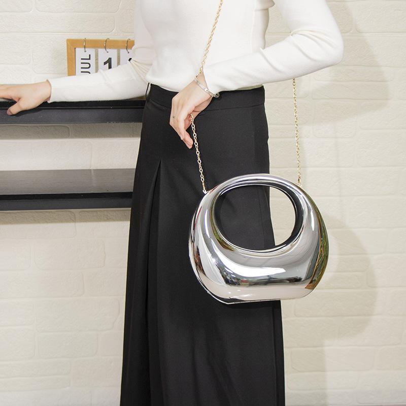 Internet celebrity acrylic bag 2025 new European and American fashion glossy personality design ins women messenger dumpling bag