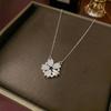 Women's Heart-Shaped Necklace with Four-Petal Flower, Cubic Zirconia, Titanium Steel Clavicle Chain - Elegant and Versatile Accessory