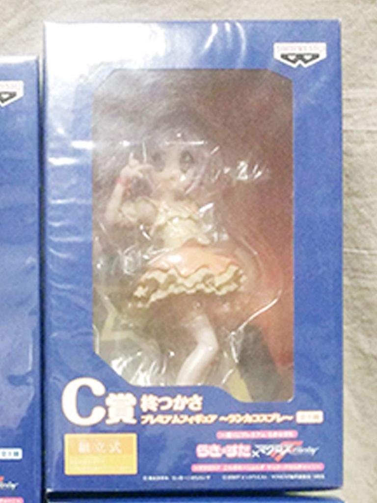Ichiban Kuji Premium Lucky Star Macross F Collabore Shonzu Yak Cena Tsukasa Hiiragi Prémiová figurka Deculture! C (Ranka Cosplay)
