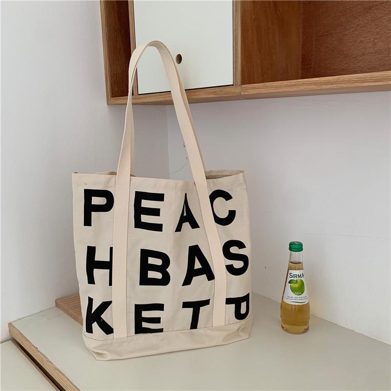 Женская холщовая сумка персикового цвета с буквенным принтом — фото 6