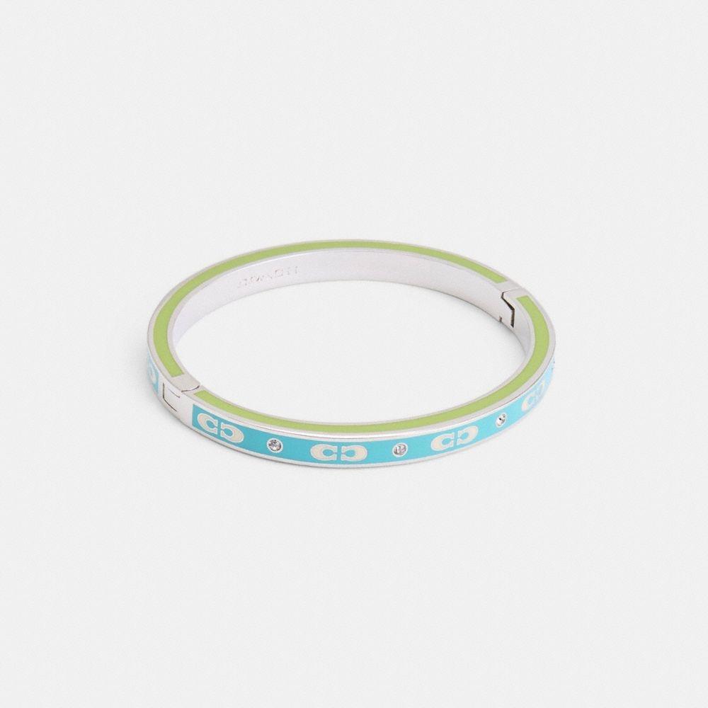 

Браслет COACH Signature Enamel Hinged Bangle CV258 E7N Silver Marl