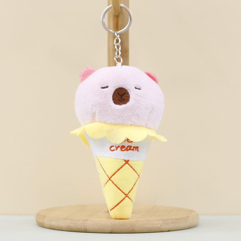 

Cream Ice Charming Capybara Bag Accessory Plushie Sweet Cuddly And жовтий