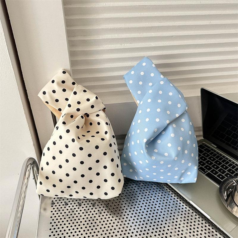 Wrist bag Canvas handbag Office worker going out handbag Internet celebrity handbag Change storage Small cloth bag