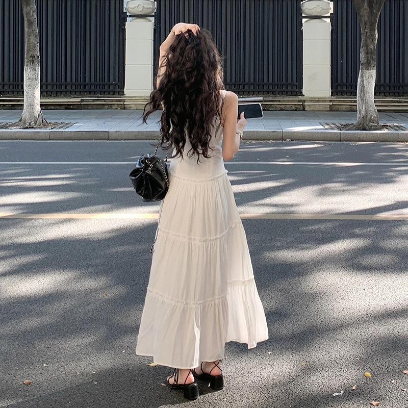 Gentle wind white suspender dress women's 2026 summer new high-end temperament versatile waist and thin dress