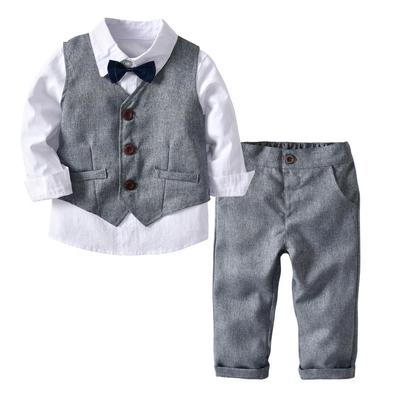 Toddler Boy Gentleman Outfit: Solid Color Vest, Long-Sleeve Shirt, Long Pants, and Bow Tie - Spring Collection.