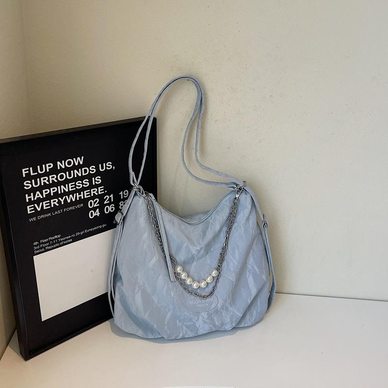 Urban simple large-capacity bag female summer new college students class shoulder women's bag high value messenger bag