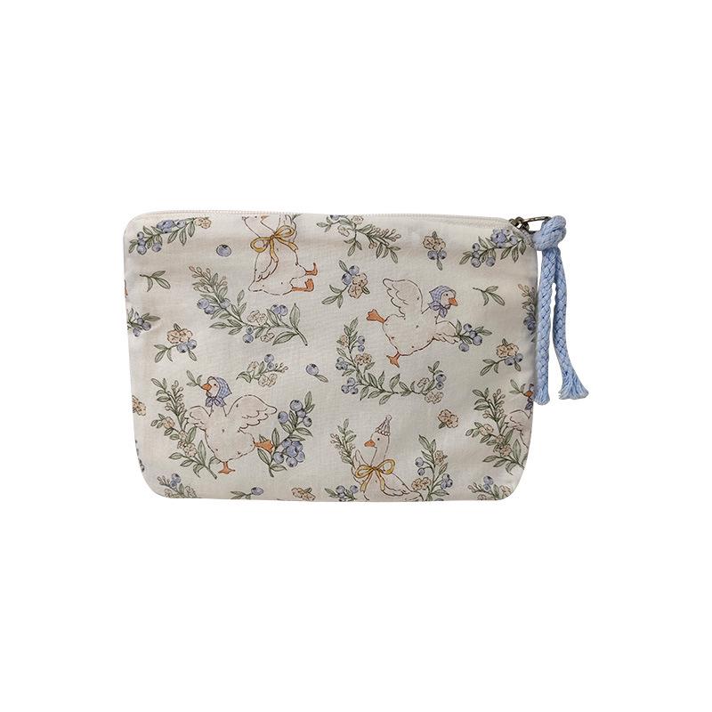 Adorable Blue Cartoon Makeup Bag: Mini Pure Cotton Coin and Earphone Pouch, Lipstick Carrier, Portable Storage.