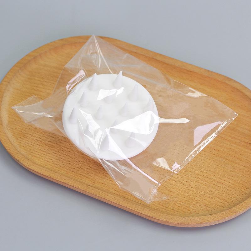 

Мягкая массажная щетка-шампунь для кожи головы - Силиконовая расческа из ТПР