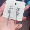 Boucles d'oreilles étoiles scintillantes à franges en argent 925, nouveau design de niche tendance haut de gamme, pour visage rond et boucles d'oreilles fines, boucles d'oreilles.