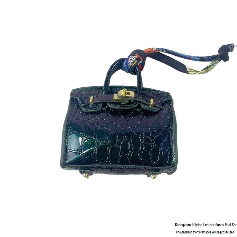 

Мини-сумка-шарм из натуральной кожи для трансграничной торговли - Идеально подходит для помады, наушников и ключей