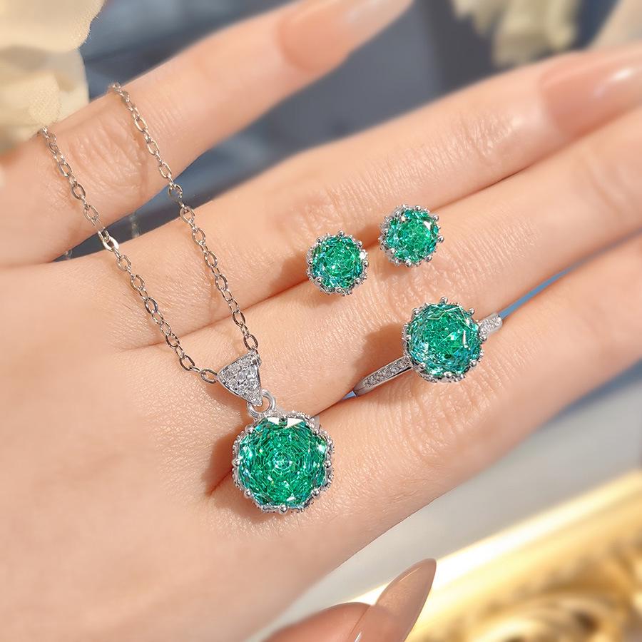 Octagonal Rose-Cut Tanzanite Pendant with High-Carbon Diamonds, Colorful Diamond Earrings, and Paraiba Ring