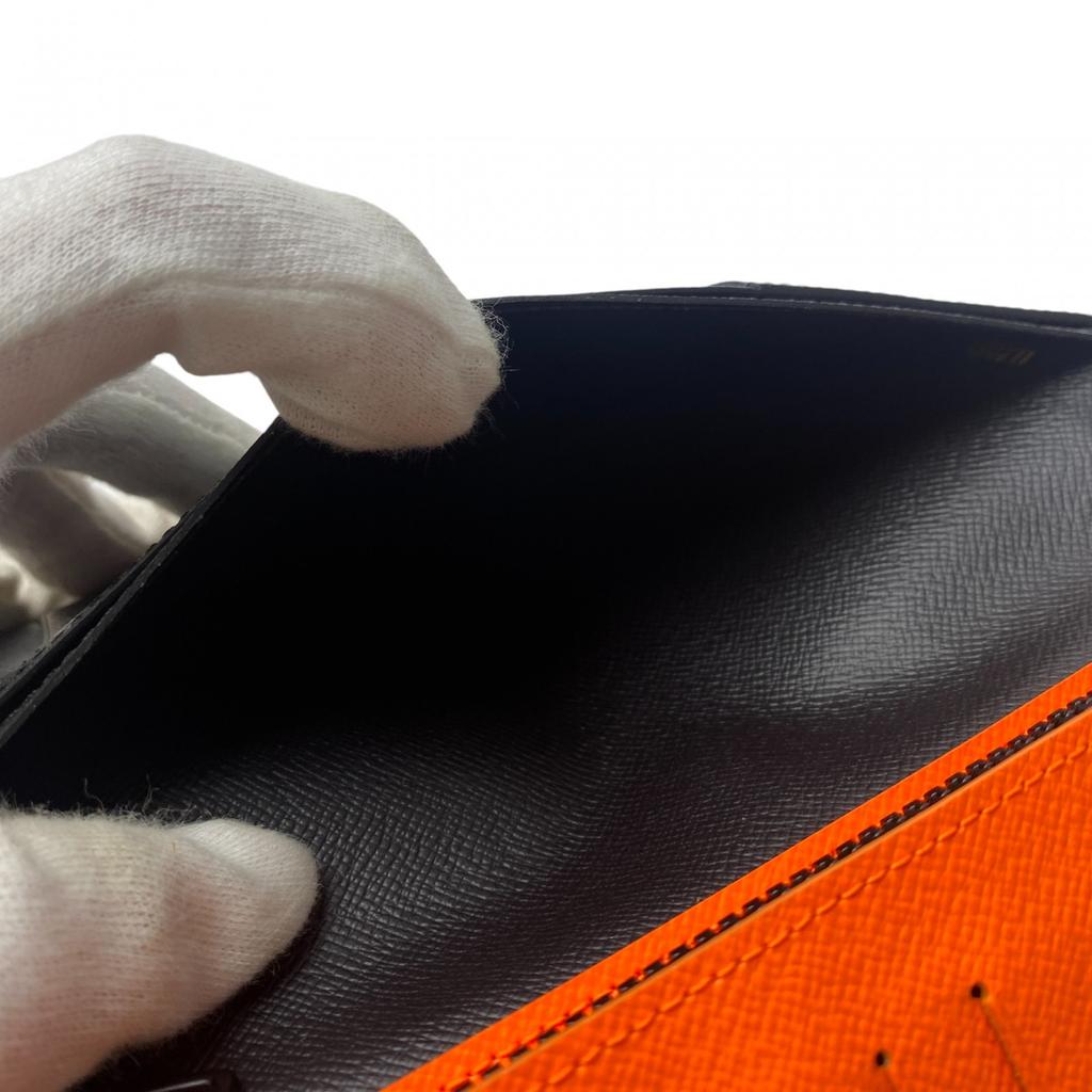 Używany portfel LOUIS VUITTON Seria Brązowo/Pomarańczowa PVC męski