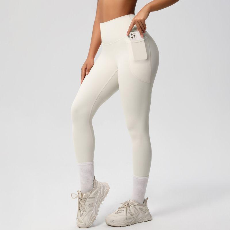 Fashion Nude Feel Beauty Back Cross Bubble Wrap Sports Bra High Waist Hip Lift Pocket Sports Yoga Pants Fitness Suit Women