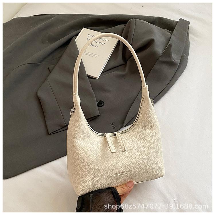 Exquisite underarm bag women 2025 new fashion dumpling bag Korean version niche design shoulder messenger bag