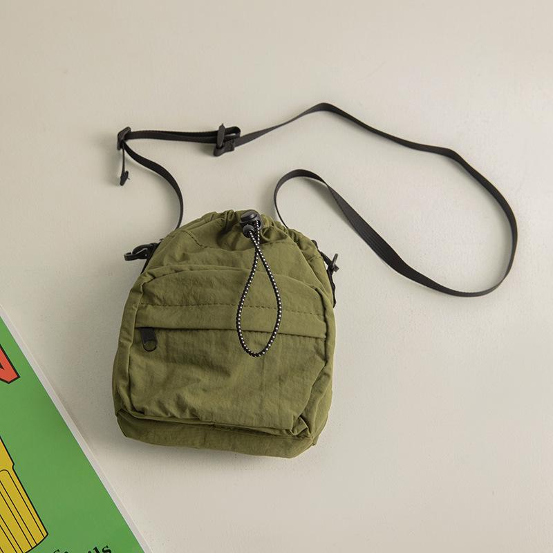 

Сумка-мессенджер из нейлона с завязками на шнурке в корейском стиле 2023 года — легкая, универсальная летняя женская сумка через плечо зелёный