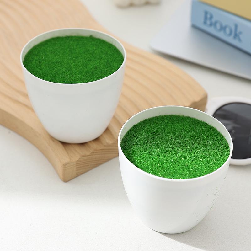 Simulated plastic pots for artificial flowers or succulents, perfect for table display.