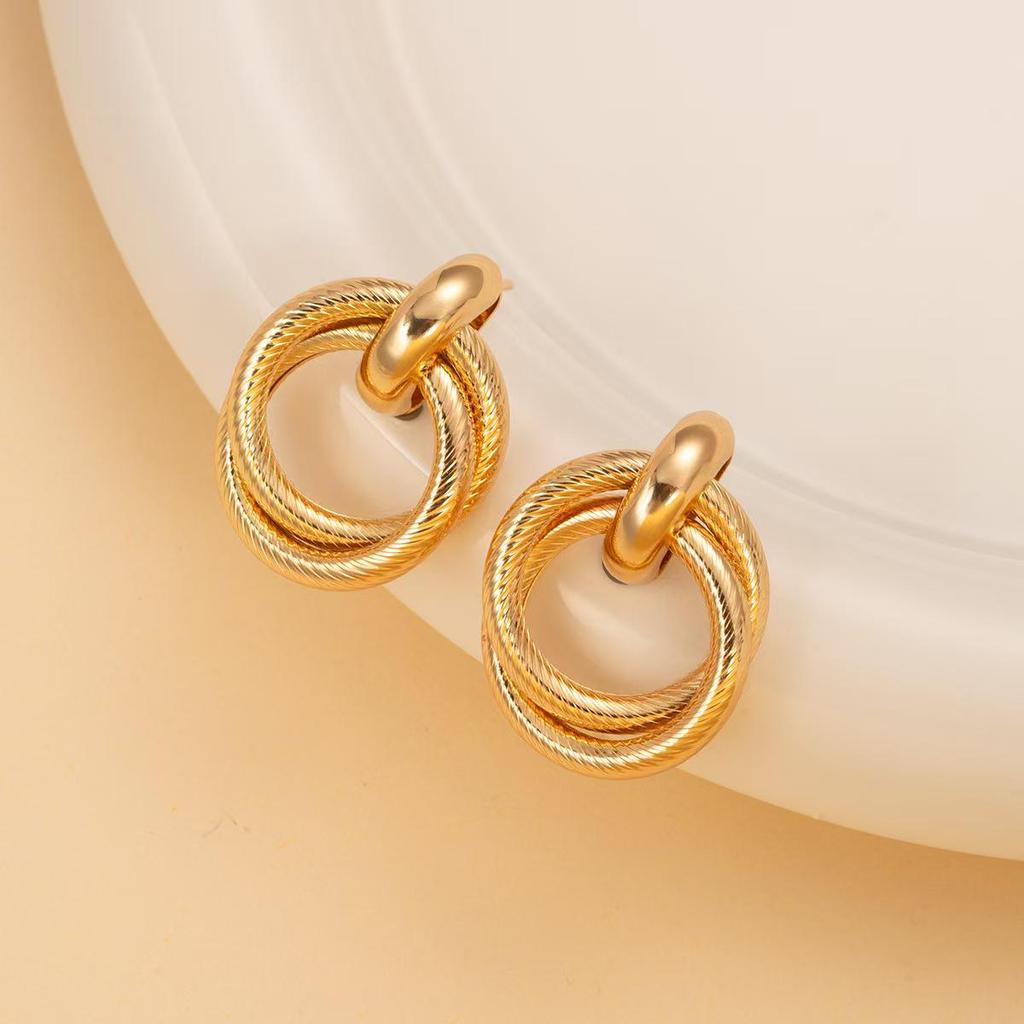 Gold-Tone Geometric Twist Earrings: Fashionable and Versatile Multi-Layer Braided Earrings for Women.
