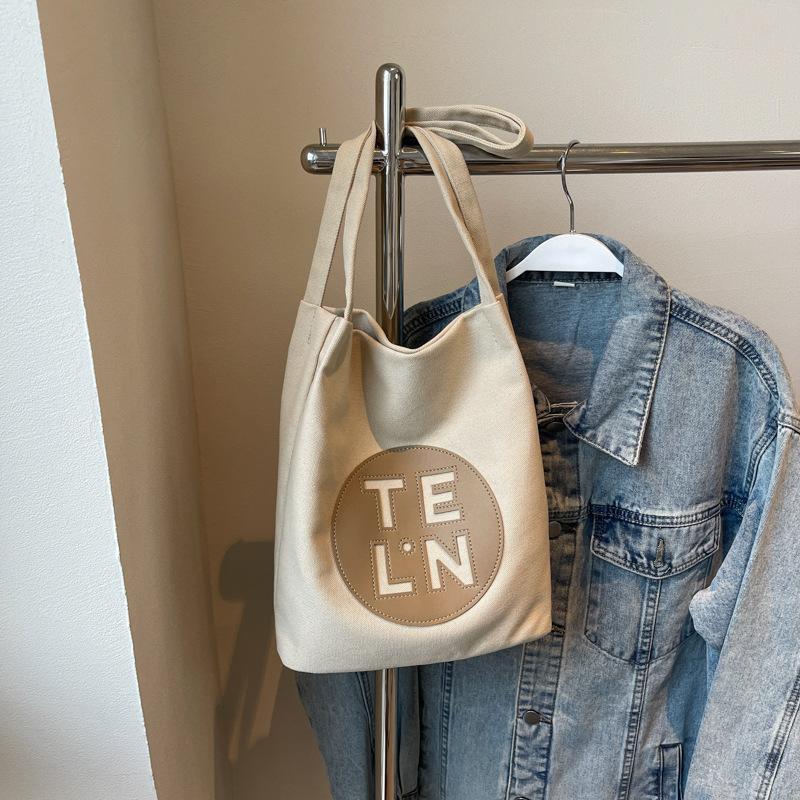 

2025 early autumn Korean version of literary canvas retro messenger bag unisex handbag commuter bag student shoulder bag хаки