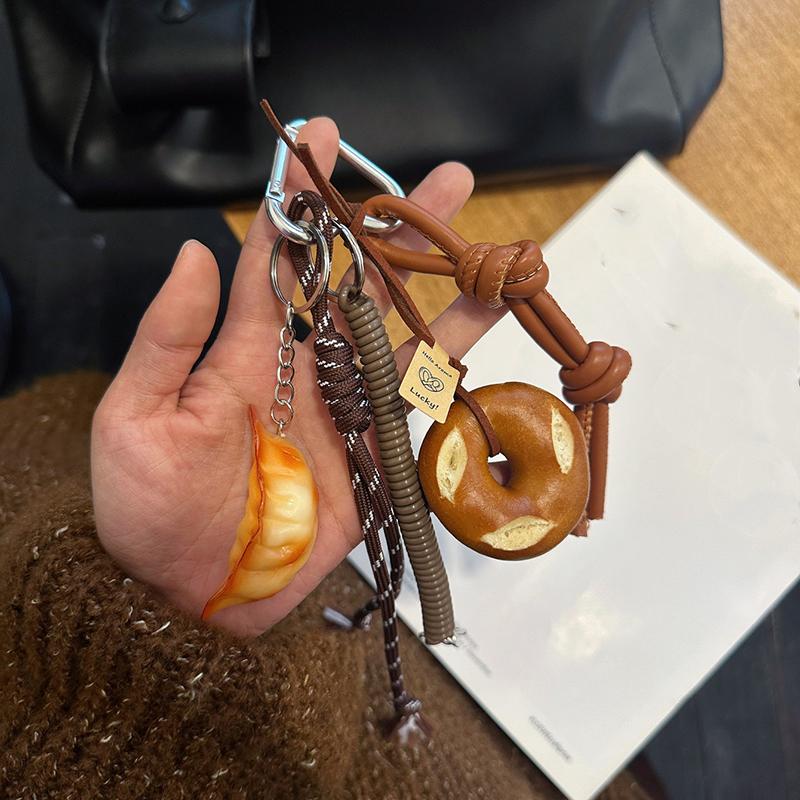 Yogodlns Cute Smiling Face Bread Woven Rope Dumpling Pendant Bag Accessory Handmade Trendy Bag Hanging Alkali Water Bread Bagel Bag Pendant