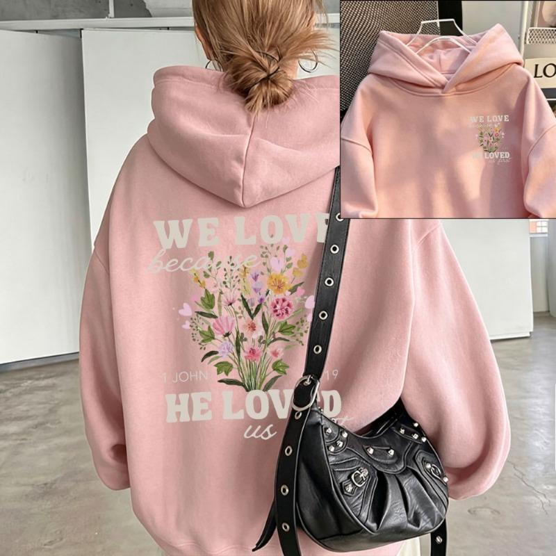 Women We Love Because He Loved Us First Wildflower Christian Graphic Hoodie Front Back Print 1 John 4:19 Bible Verse Hooded Tops