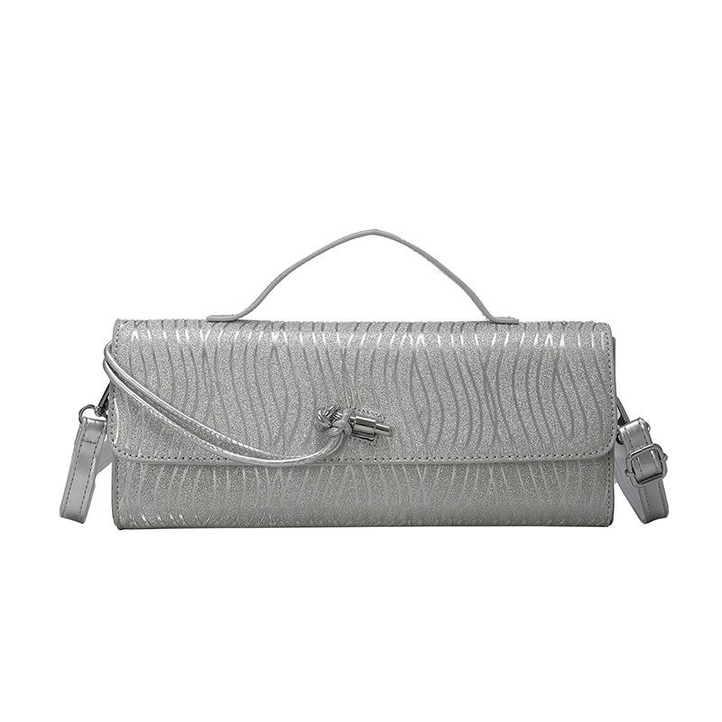 

New woven bag, high-end niche shoulder bag, fashion trend, hand-held dinner bag, light luxury oblique span baguette bag