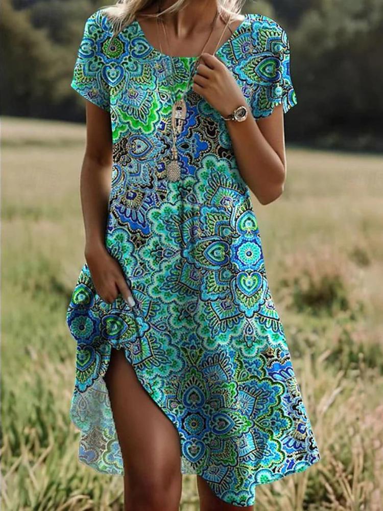 

Женское платье с коротким рукавом и цветочным принтом, круглым вырезом и асимметричным подолом S