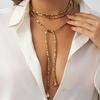 Elegant European-American Light Luxury Pearl Beaded Long Necklace with Tassel and Metal Accents