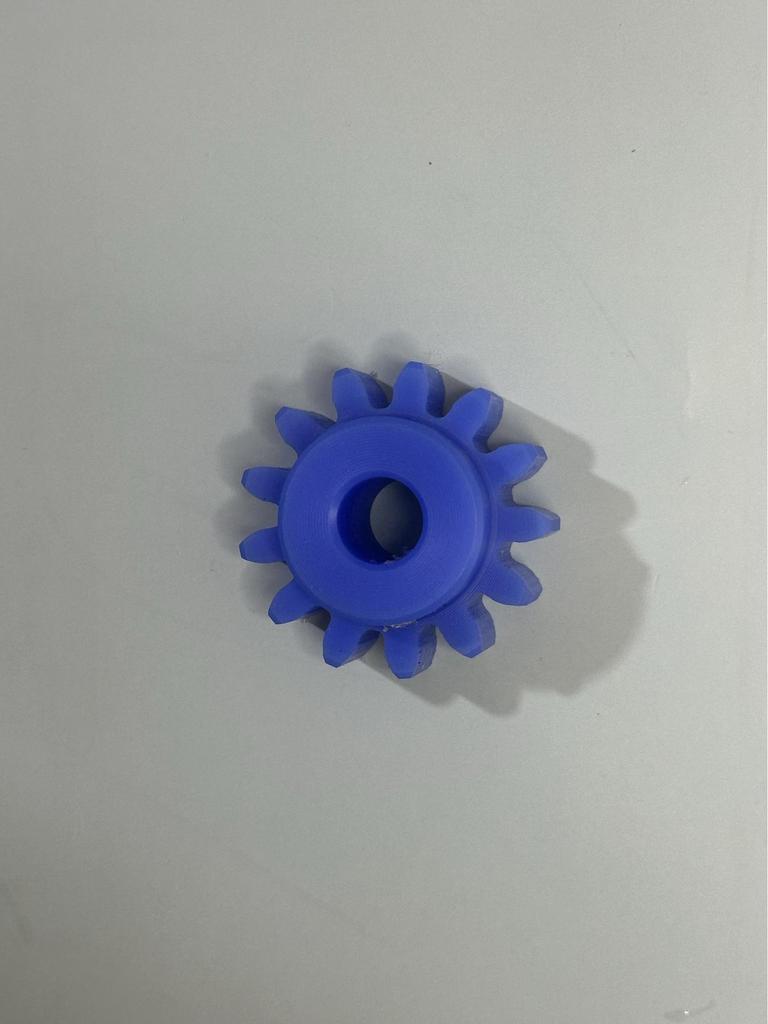 Xizhuo Punching Machine Accessories: Turbine Worm Gear, Rubber Roller, Bracket, and Brush Holder.