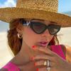 Women's sunglasses, small-frame V-shaped cat eye sunglasses.