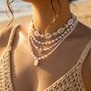 Bohemian Handgefertigter Seestern Sonne Anhänger Halskette für Damen Sommer Muschel Imitation Perle Reiskorn Perlen Choker Strandurlaub Schmuck