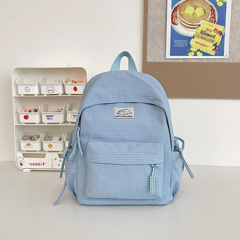 Schoolbag small fresh student schoolbag female Japanese cute solid color simple primary and secondary school student backpack leisure travel backpack