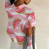 Plus-size watermelon print short-sleeved women's shirt, loose fit, slimming, casual summer top.