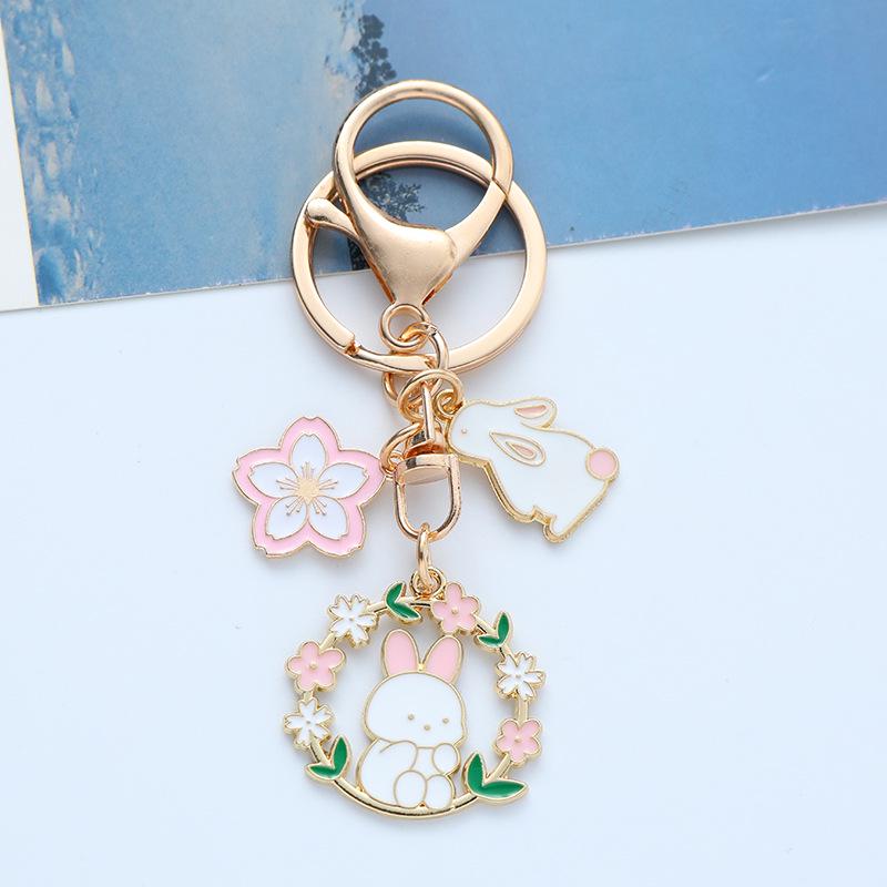 Korean Cute Rabbit Keychain with Cherry Blossom and Moon Design – Perfect Bag Ornament or Couple Decoration