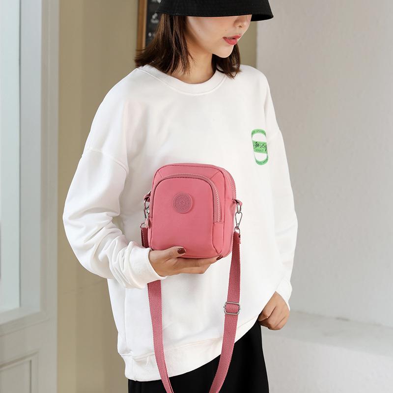 

Новая минималистичная многофункциональная модная маленькая сумка кроссбоди из нейлоновой ткани, женская сумка, повседневная сумка, сумка на плечо, сумка кроссбоди, кошелек для монет розовый