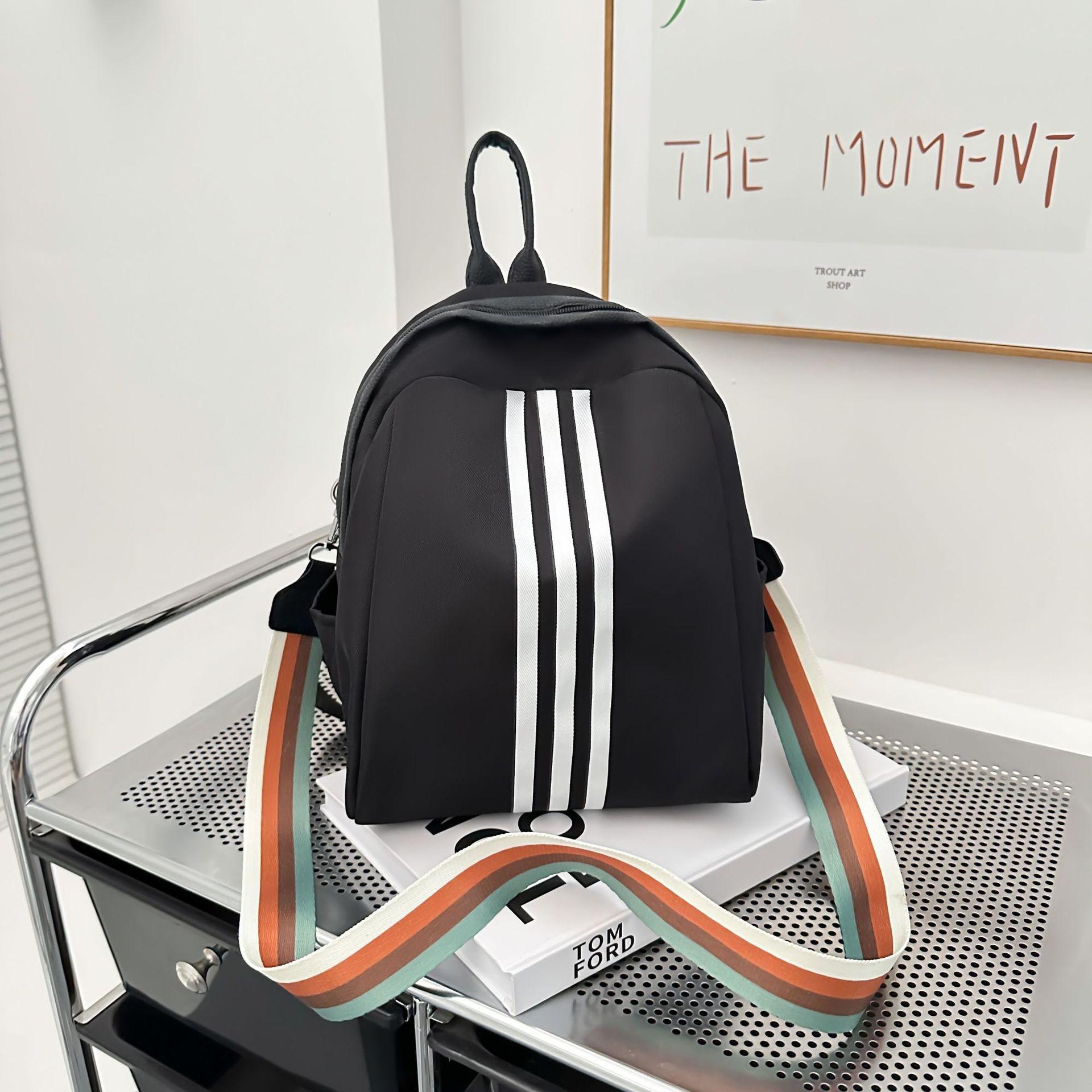 

Ladies casual three-bar backpack, low-priced commuter bag, waterproof one pack, dual-purpose messenger light travel backpack.